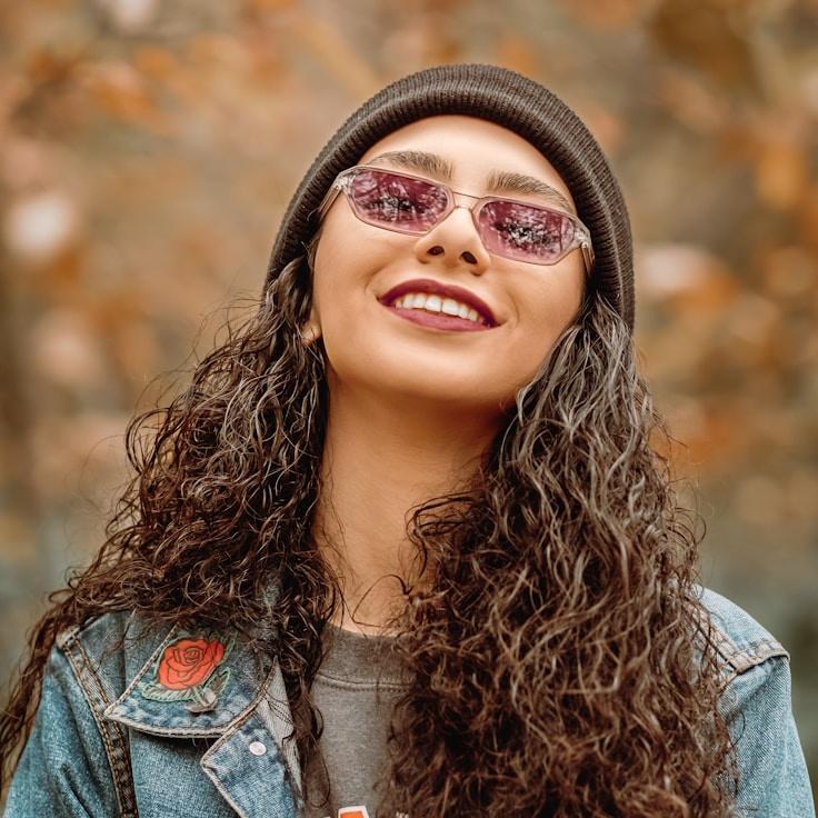Alex Rivera, Lead Design Curator at HarvestNectarOpal, reviewing corporate floral arrangements